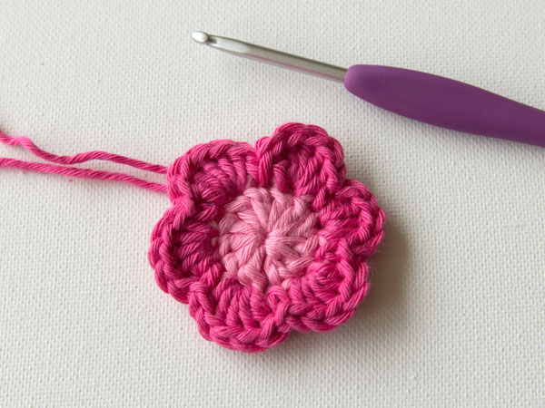 Finished flower with yarn still attached